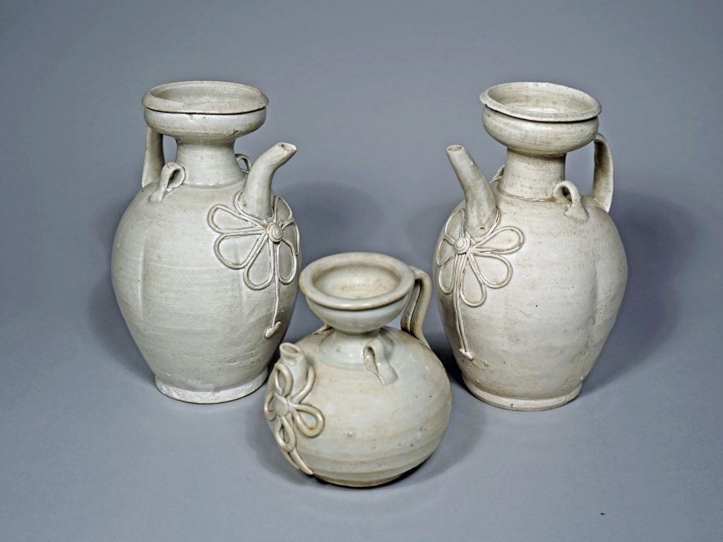 Qingbai Glazed String Design Ewers